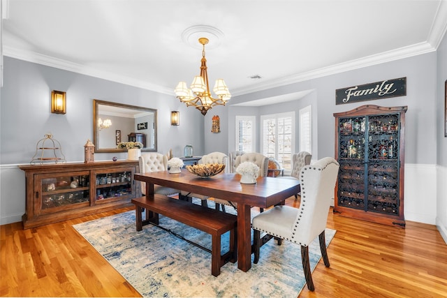 10 Von Trapp Ct, Washingtonville, NY 10992 - dining area featuring a chandelier, light wood-type flooring, and ornamental molding