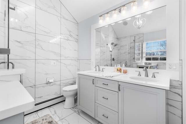 10 Von Trapp Ct, Washingtonville, NY 10992 - full bath featuring a baseboard radiator, marble finish flooring, double vanity, a marble finish shower, and tile walls