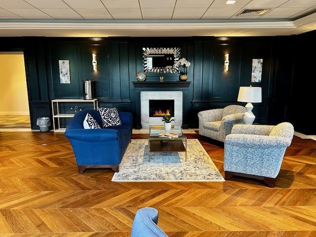 112-01 Queens Blvd Unit 20-E, Forest Hills, NY 11375 - sitting room featuring a lit fireplace