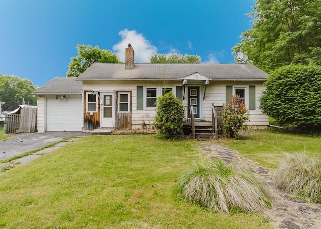 8 Gary Dr, Hyde Park, NY 12538 - ranch-style home with a garage, a chimney, a front yard, and asphalt driveway