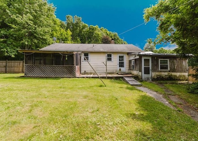 8 Gary Dr, Hyde Park, NY 12538 - rear view of house with a sunroom and a chimney