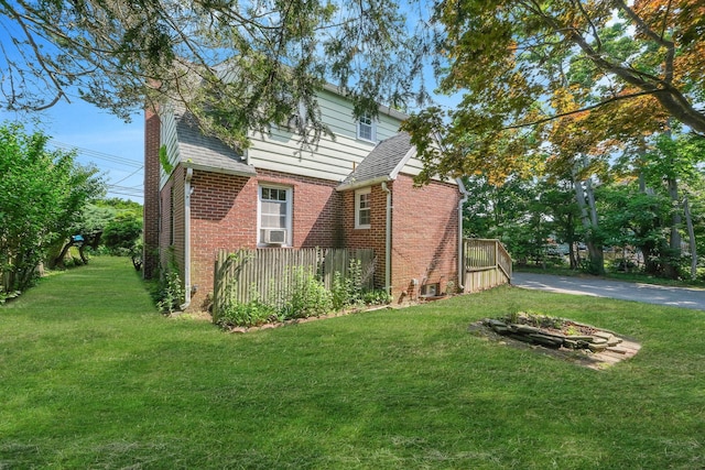 126 Carman St, Patchogue, NY 11772 - view of property exterior with brick siding and a chimney
