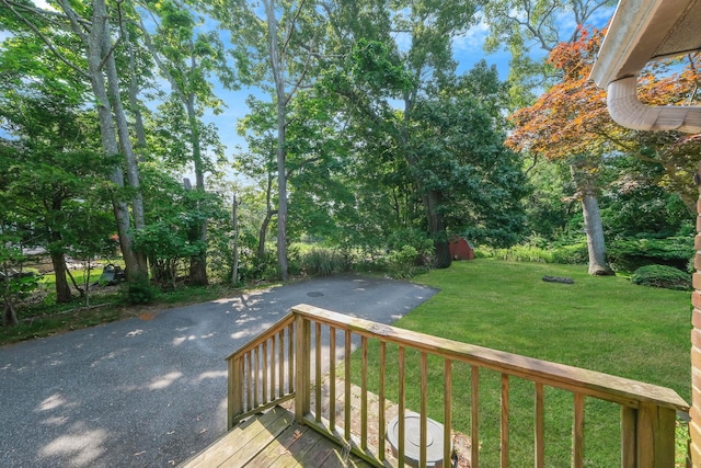 126 Carman St, Patchogue, NY 11772 - deck featuring a lawn