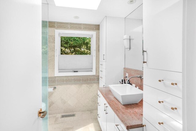 305 Fire Island Blvd, Fire Island Pines, NY 11782 - full bath with vanity and a skylight