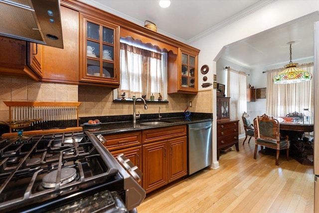 1528 Rhinelander Ave, Bronx, NY 10461 - kitchen featuring dishwasher, brown cabinetry, light wood-style floors, gas range oven, and ornamental molding