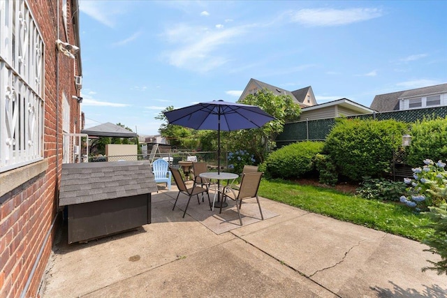 1528 Rhinelander Ave, Bronx, NY 10461 - view of patio featuring outdoor dining space