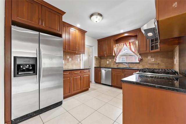 50-55 Cloverdale Blvd, Bayside, NY 11364 - kitchen with stainless steel appliances, ventilation hood, tasteful backsplash, light tile patterned flooring, and brown cabinets