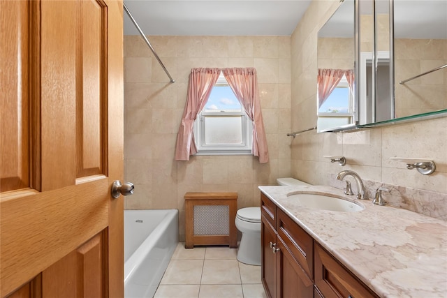 50-55 Cloverdale Blvd, Bayside, NY 11364 - bathroom with tile patterned flooring, vanity, tile walls, and bathing tub / shower combination