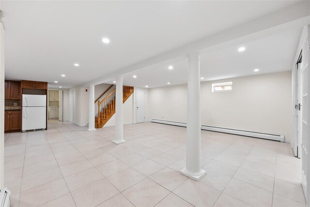 50-55 Cloverdale Blvd, Bayside, NY 11364 - basement with freestanding refrigerator, baseboard heating, stairway, and recessed lighting
