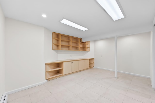 50-55 Cloverdale Blvd, Bayside, NY 11364 - finished basement featuring a baseboard radiator and recessed lighting