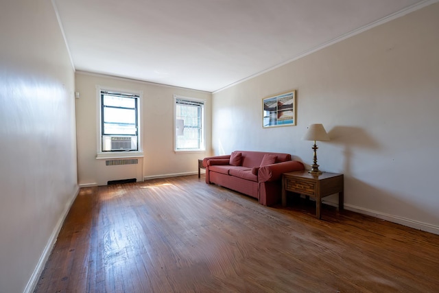 251 Seaman Ave Unit 6A, New York Manhattan, NY 10034 - living area with radiator, ornamental molding, wood finished floors, and cooling unit