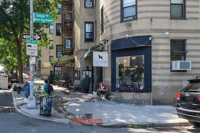 251 Seaman Ave Unit 6A, New York Manhattan, NY 10034 - view of building exterior featuring cooling unit