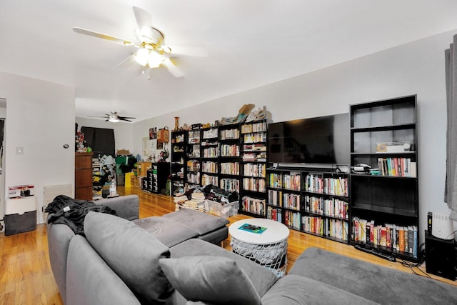66-48 73rd Pl, Middle Village, NY 11379 - living room featuring a ceiling fan and wood finished floors