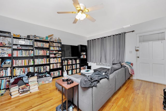 66-48 73rd Pl, Middle Village, NY 11379 - living area featuring ceiling fan and wood finished floors