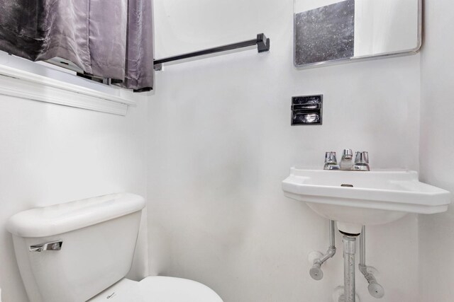 66-48 73rd Pl, Middle Village, NY 11379 - bathroom featuring toilet