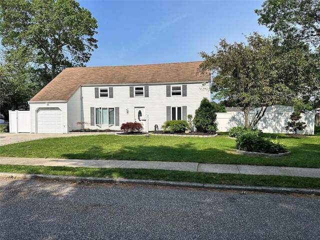 7 Lurcott Ln, Central Islip, NY 11722 - colonial home featuring a garage and driveway
