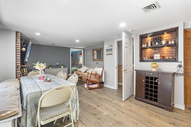 883 Saint James Pl, Franklin Square, NY 11010 - dining space with light wood-style flooring and recessed lighting