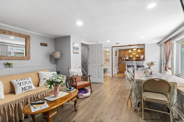 883 Saint James Pl, Franklin Square, NY 11010 - living room with ornamental molding, light wood-style floors, recessed lighting, and stairway