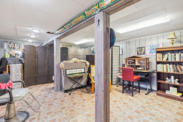 883 Saint James Pl, Franklin Square, NY 11010 - office space featuring brick patterned flooring, a paneled ceiling, and wooden walls