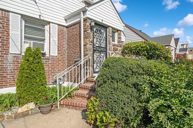 5 Charles St, Valley Stream, NY 11580 - entrance to property featuring brick siding and stone siding