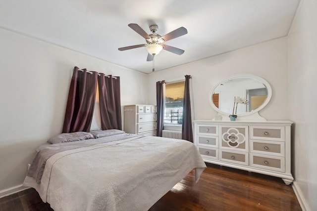 5 Charles St, Valley Stream, NY 11580 - bedroom with radiator, dark wood finished floors, and ceiling fan