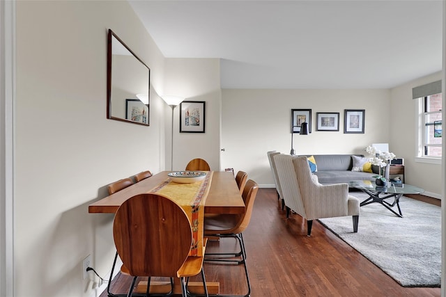 221 Schrade Unit 2G, Briarcliff Manor, NY 10510 - dining area with dark wood-style flooring and baseboards