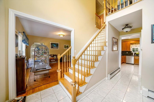 48 Brennan Ct, Chester, NY 10918 - stairs with a baseboard heating unit and tile patterned floors