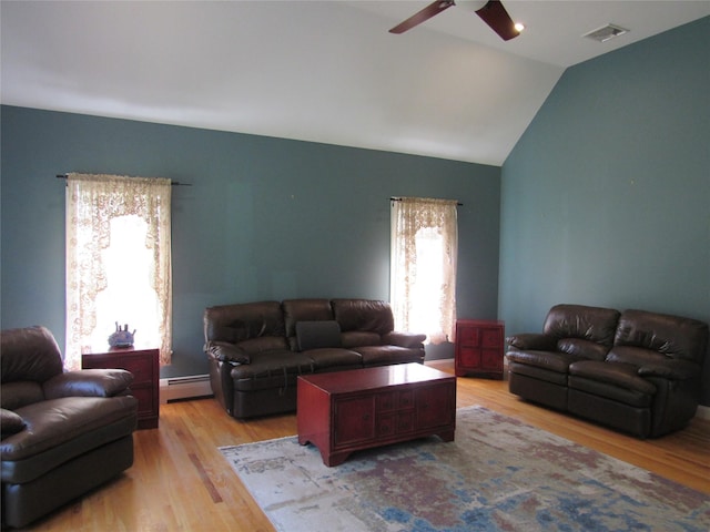 48 Brennan Ct, Chester, NY 10918 - living room featuring a ceiling fan, light wood-style flooring, lofted ceiling, and baseboard heating