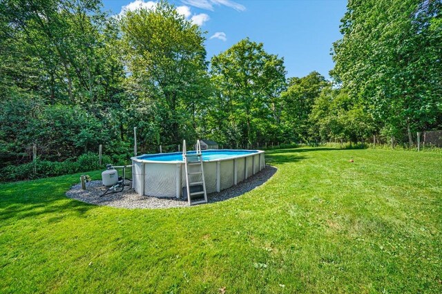 48 Brennan Ct, Chester, NY 10918 - view of green lawn with an outdoor pool