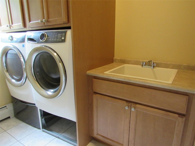 48 Brennan Ct, Chester, NY 10918 - laundry room featuring cabinet space, washing machine and clothes dryer, light tile patterned flooring, and a baseboard heating unit