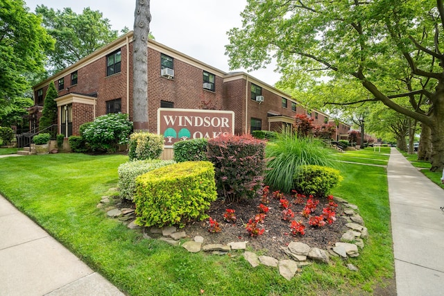 218-12 73rd Ave Unit 401A1, Oakland Gardens, NY 11364 - community sign featuring a yard