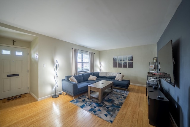 218-12 73rd Ave Unit 401A1, Oakland Gardens, NY 11364 - living area featuring light wood finished floors