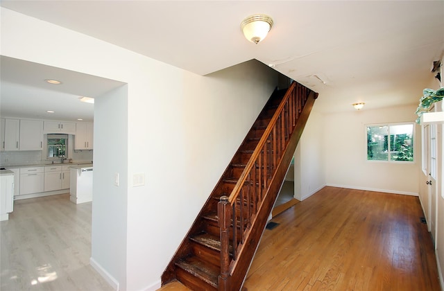 1565 Rte 292, Holmes, NY 12531 - staircase with wood finished floors, healthy amount of natural light, and recessed lighting