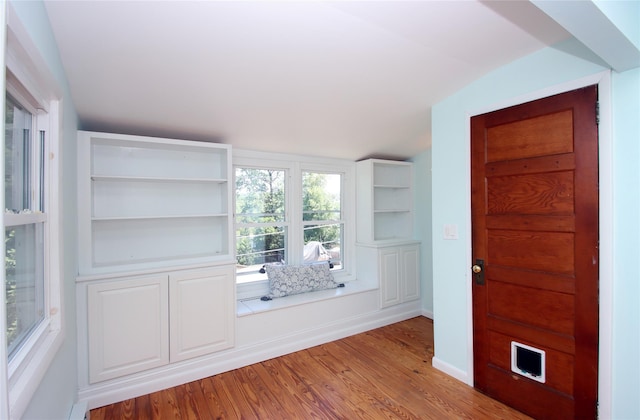 1565 Rte 292, Holmes, NY 12531 - empty room with light wood-style floors and vaulted ceiling