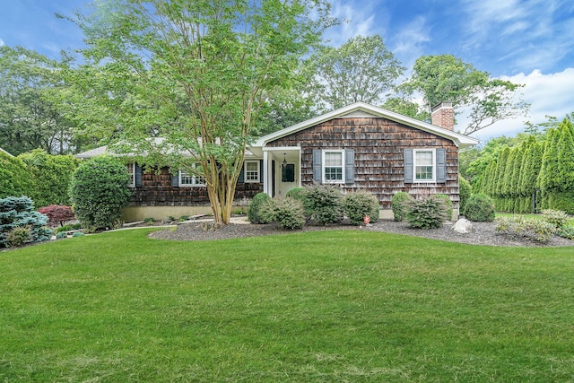 30 Twixt Hills Rd, Saint James, NY 11780 - view of front facade with a chimney and a front yard