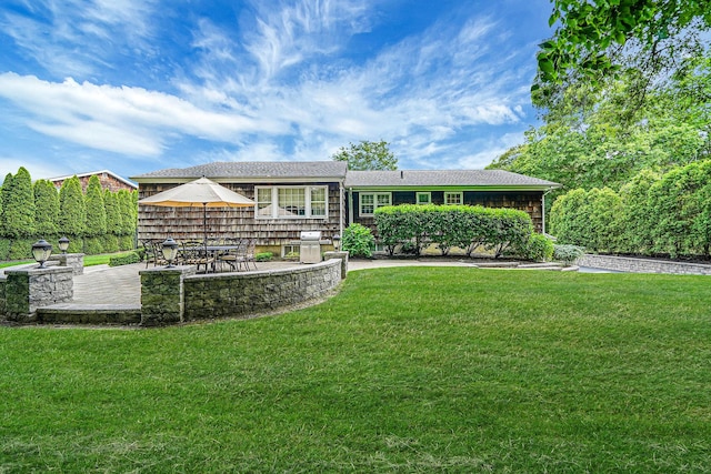 30 Twixt Hills Rd, Saint James, NY 11780 - rear view of property featuring a patio area and a yard