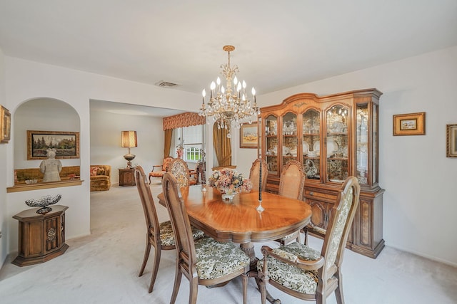 30 Twixt Hills Rd, Saint James, NY 11780 - dining space with light colored carpet and a chandelier