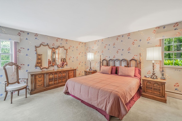 30 Twixt Hills Rd, Saint James, NY 11780 - bedroom with wallpapered walls, carpet floors, and a baseboard radiator