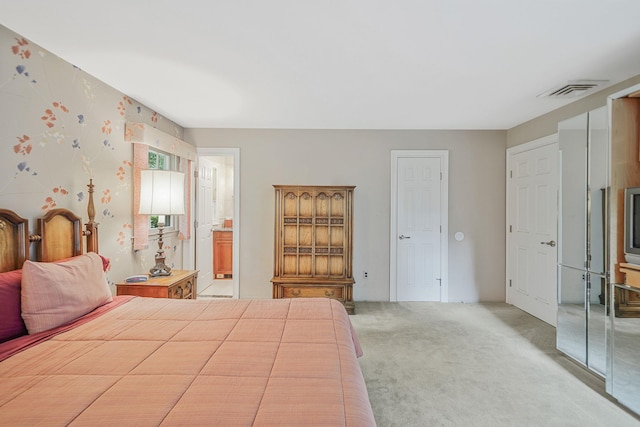 30 Twixt Hills Rd, Saint James, NY 11780 - bedroom with light carpet and ensuite bath