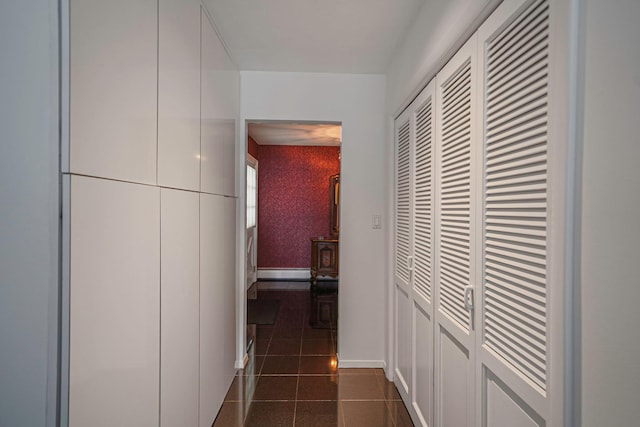 30 Twixt Hills Rd, Saint James, NY 11780 - corridor featuring dark tile patterned flooring