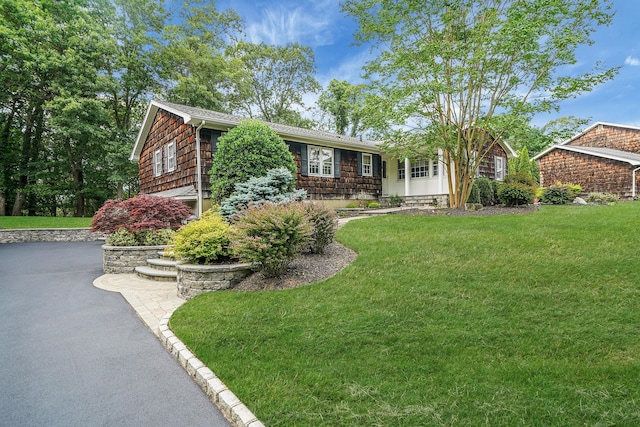 30 Twixt Hills Rd, Saint James, NY 11780 - ranch-style house with a front lawn