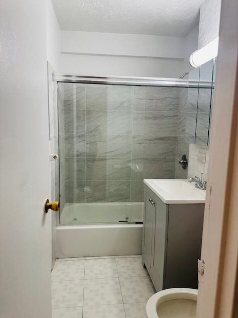 86-05 60th Rd Unit 2E, Elmhurst, NY 11373 - bathroom with tile patterned flooring, vanity, and shower / bath combination with glass door