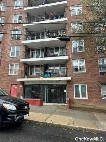 86-05 60th Rd Unit 2E, Elmhurst, NY 11373 - view of apartment building / complex