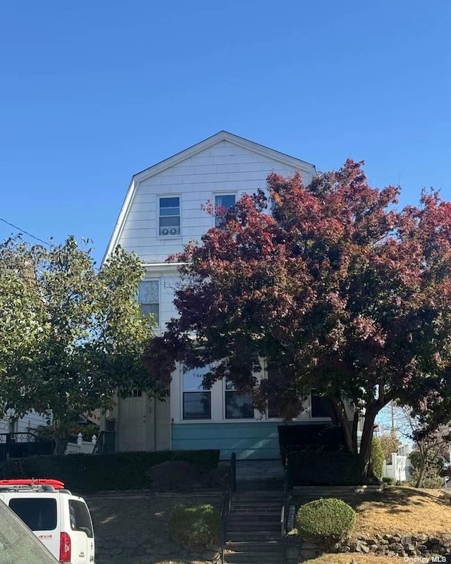 43-67 149th St, Flushing, NY 11355 - view of front of home featuring a gambrel roof and stairs