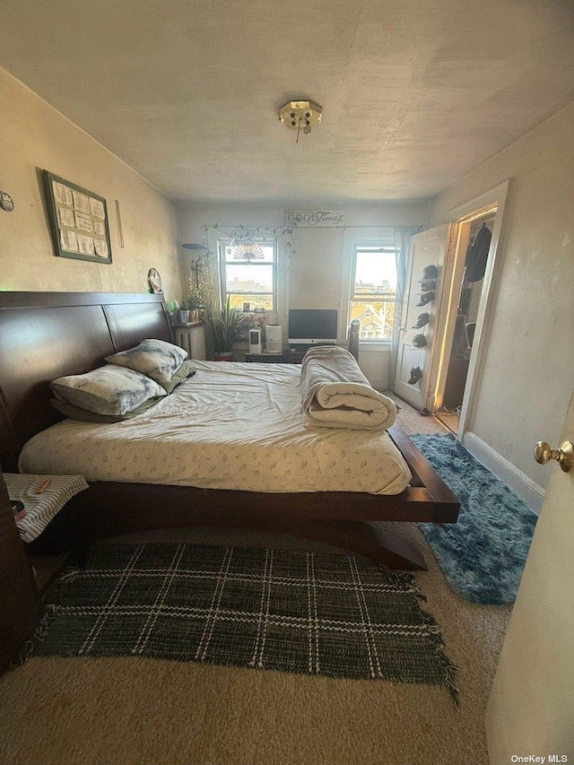 43-67 149th St, Flushing, NY 11355 - carpeted bedroom with baseboards