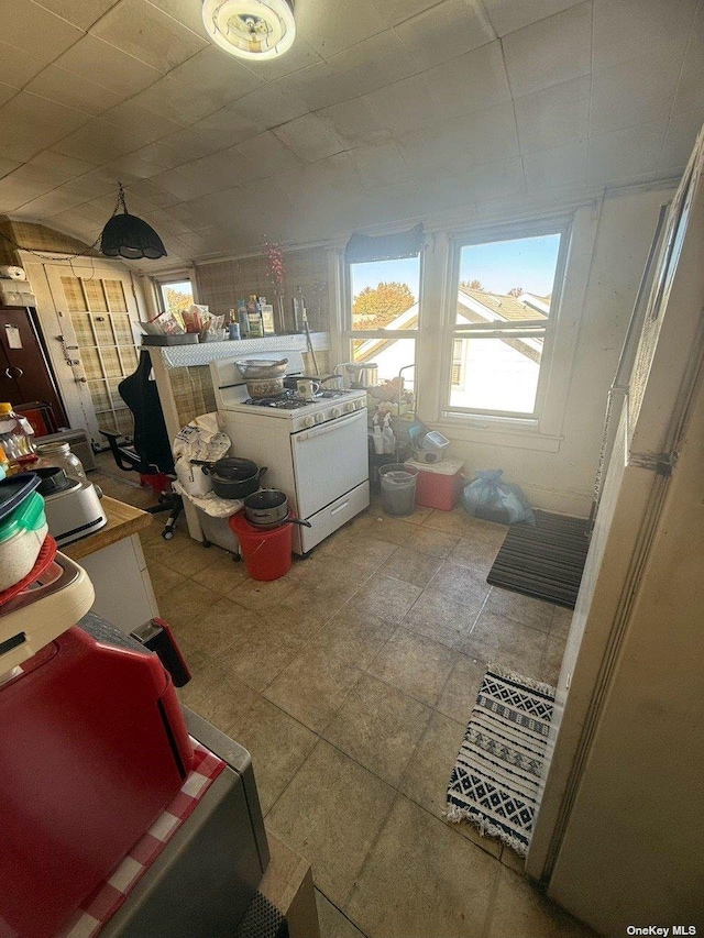 43-67 149th St, Flushing, NY 11355 - interior space featuring white range with gas cooktop and healthy amount of natural light