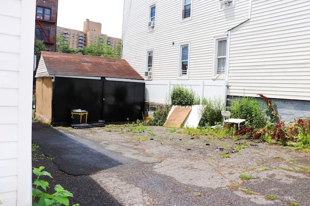 1460 Commonwealth Ave, Bronx, NY 10460 - view of patio featuring a storage unit