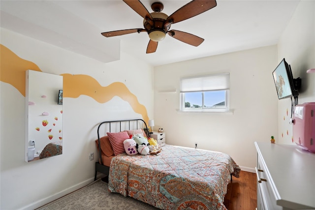 88 E Valley Stream Blvd Unit 7, Valley Stream, NY 11580 - bedroom featuring a ceiling fan and wood finished floors