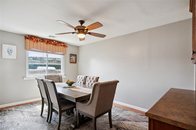 88 E Valley Stream Blvd Unit 7, Valley Stream, NY 11580 - dining area with ceiling fan and light wood finished floors