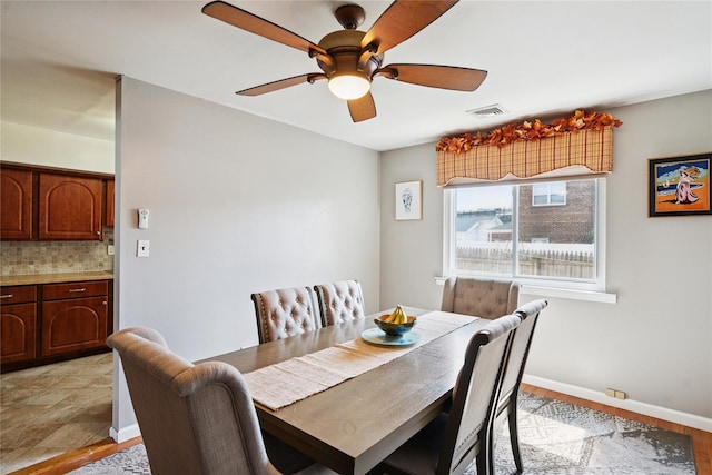 88 E Valley Stream Blvd Unit 7, Valley Stream, NY 11580 - dining area featuring ceiling fan and baseboards